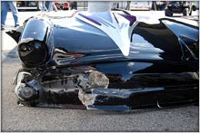 Looking over The Crashed Buick Pro Mod Damage