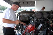 Frank Patille Doing A Valve Adjustment In The Pits